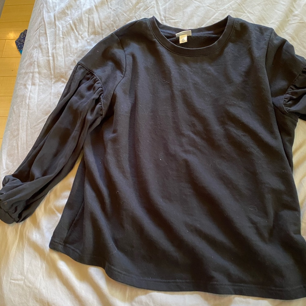 Black sweater with sheer sleeves